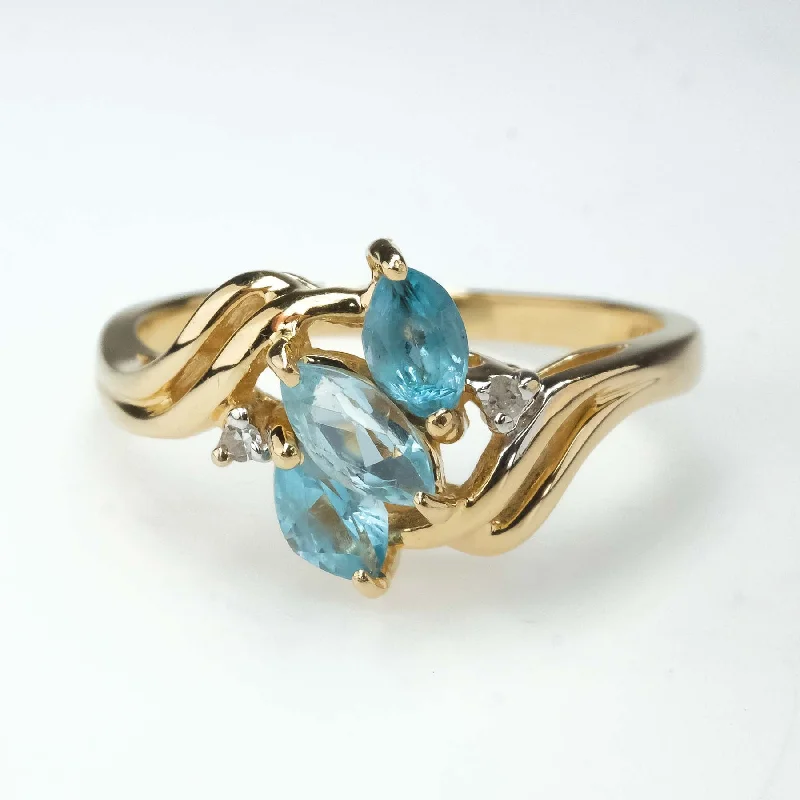 Organic form engagement rings-0.57ctw Blue Topaz with Diamond Accents Gemstone Ring in 14K Yellow Gold