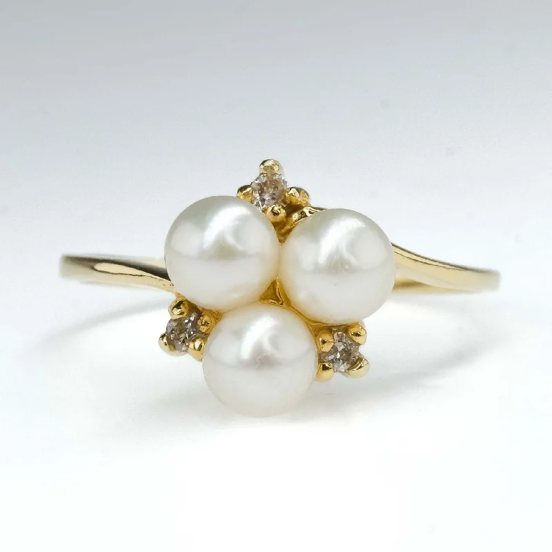 Surf theme engagement rings-Pearl & Diamond Accented Bypass Ring Size 6.5 in 14K Yellow Gold